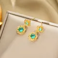 Luxurious gold-plated titanium earrings with round green gemstone and zircon accents - Stud Earrings / Gold