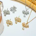 Schmuckset aus Titanstahl mit Schleife, Zirkonia-Halskette und Ohrsteckern für Damen - Goldene Schleifen-Halskette Ohrringe