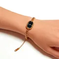 Elegant gold chain watch for women with oval black dial and Greek key pattern - U-Shaped Link Style / Gold