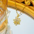 Rotating rose flower pendant necklace in gold plated titanium steel with sparkling crystals - Gold