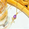 Elegant gold-tone tulip necklace featuring a large purple teardrop crystal pendant - Gold-Purple