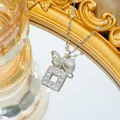 Silver bow and hollow square geometric pendant necklace set with sparkling zircons - Necklace / Silver