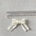 Mini fiocco in tessuto bianco per fai-da-te e accessori per bambole largo 3,3 cm - Bianco