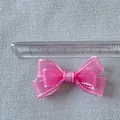 Detail of a 4.5cm pink organza bow for DIY pet accessories and clothing decor - Rose Red