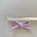 Detailed view of handmade light purple fabric bow showing 5.5cm width measurement - Light Purple Style (5)