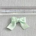 Detail of 2.2cm mint green polka dot bow accessory measured with a clear ruler scale - Mint Green(5)