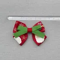 Close-up of 8.5cm red Christmas ribbon bow with Santa Claus and snowflake patterns - Red Santa Claus Golden Snowflake Style