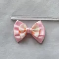 Detail view of 8cm dual-layer pink and white ribbon bow with ruler measurement - Pink Satin Ribbon Print Patchwork Style (7)