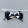 Detail of DIY bow accessory featuring black white ribbons and pearl drop on ruler - French Vintage Round Pearl Pendant Style (7)