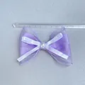 Detail of purple organza bow with white pearl accent and silk layer, 8.5cm wide accessory - Double Organza Pearl Style (5)