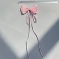 Pink satin bow hair accessory with white polka dot mesh and a pearl center on fabric - Polka Dot Mesh Style (3)