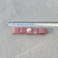 Pink satin ribbon bow with pearl center measuring 8.5cm on a transparent ruler - Pink With Pearl (5)