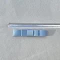 Macro view of a 7.5cm light blue double-layered satin ribbon bow with ruler scale measurement - Baby Blue (7)