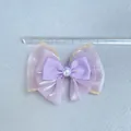 Detail shot of purple organza bow with faux pearl measuring approximately 8.5cm wide - Ribbon Pearl Style (6)