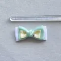 Detailed view of a green polka dot ribbon bow with a heart-shaped gemstone and ruler - Mint Green Polka Dot Style (4) / Mint Green(4)