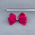 Close-up of pink grosgrain bow hair clip with heart rhinestone and ruler for scale - Rose Red Heart Faux Diamond Style (4)