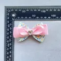 Nœud floral en tissu et satin rose avec cœur en cristal et mesure de la taille - Rose (7)
