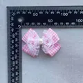 Detailed close-up of a pink plaid bow with white lace and pearl, size measured at 5cm - Pink White Plaid