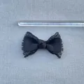 Close-up of handmade 7.5cm black grosgrain ribbon and lace bow for DIY crafts - Black Lace Double Layered Bow (4)