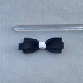 Macro view of a 5.5cm black and white handmade ribbon bow for DIY hair accessories - Small Black And White Contrast Bow (7)
