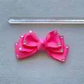 Detail view of pink bow hair clip with rhinestones and 9cm measurement ruler - Rose Pink