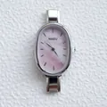 Macro shot of oval pink mother-of-pearl dial and silver stainless steel link bracelet - Pink Mother of Pearl Dial Silver Strap