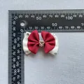Detail view of red and white bow hair accessory with heart crystal and size measurement - Red and White Satin Style (7)