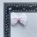 Three-layer mesh tulle bow accessory with sequins and star rhinestone measured by a ruler - White Lilac Purple Bow (1)