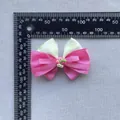 Detail view of pink satin and floral mesh bow hair accessory with strawberry charm - Pink Strawberry Daisy Style (10)