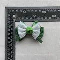 Handmade forest green mesh bow with glitter dots shown next to a ruler for scale - Deep Green Satin Ribbon With Polka Dot Mesh Style(3)