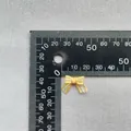 Mini fiocco di seta gialla 1,5cm con bordo dorato e perla per vestiti di bambole e fai-da-te - Giallo