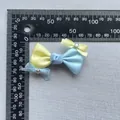 Handmade blue and yellow silk bow with rhinestones shown next to a measuring ruler - Yellow Blue Mix (1)