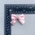 Pink satin ribbon bow with heart rhinestone detail and 40mm size measurement - Single Heart Rhinestone Satin Style (4)