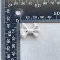 Silver-grey satin bow accessory measured on a ruler for DIY crafts and hair accessories - Silver Gray (2)