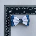 Detailed close-up of double-layer navy and white bow with polka dot center and scale - Navy and White Brushed Texture (4)