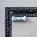 Handgemaakte lichtblauwe lintstrik met parel voor DIY-decoratie en handwerk - Lichtblauw