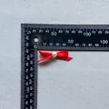 Detail of handmade red ribbon bow with center pearl pearl for cake and DIY crafts - Bright Red (13)