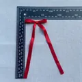 Detailed size measurement of a red satin ribbon bow accessory with long hanging streamers - Red Satin Long Streamer Style