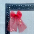 Size detail of red mesh bow with sequins measuring 160mm in length and 85mm in width - Red Mesh Long Streamer Style