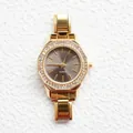 Orologio dorato ottagonale da donna con lunetta in cristallo e quadrante grigio - Stile Ottagonale Oro Quadrante Grigio Scuro Strass