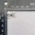 Misurazione dettagliata di un fiocco di raso grigio da 2 cm con righello per fai da te - Grigio (15)