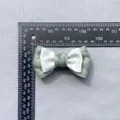 Detailed view of mint green and white ribbon bow with measurements showing 7.5cm width - Mint Green and White (7)