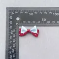 Measurement of small double-layered polka dot bow showing dimensions of 35mm by 25mm - Red Blue Polka Dot Bow (45)