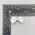 Detail view of a 4cm mint green double-layer polka dot bow with ruler measurements - Mint Green Polka Dot (57)