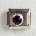Detail of Italian charm bracelet link in stainless steel with faceted purple gemstone - Deep purple