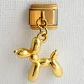 Macro view of gold balloon dog charm on a modular Italian stainless steel link bracelet - Gold