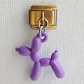 Macro detail of a purple balloon dog charm on a gold-plated stainless steel Italian link - Purple