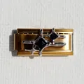 Detail of Italian charm bracelet link featuring a gold base and silver star with black stone - Black Zirconia Star Gold