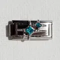 Macro detail of Italian charm bracelet link with star motif and emerald green crystals - Blue Zirconia Star Silver