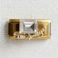 Macro detail of Italian charm link featuring a crystal stone and golden butterfly bow - Small Square Zirconia Gold Type 2
